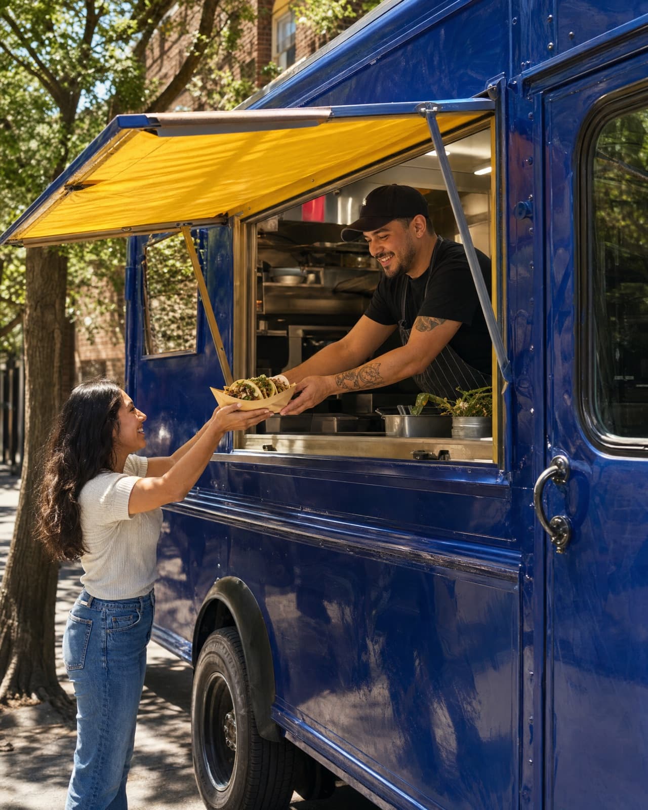 The owner or crew at work in their food truck